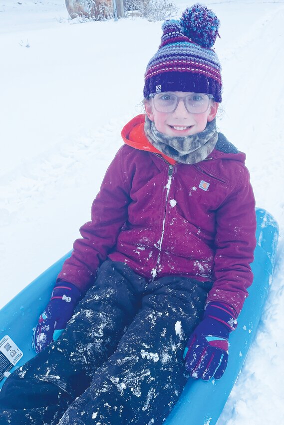 Miley Daughtery of Rural Craig enjoys being pulled around on a sled as children had a two-day break from school thanks to the snow.