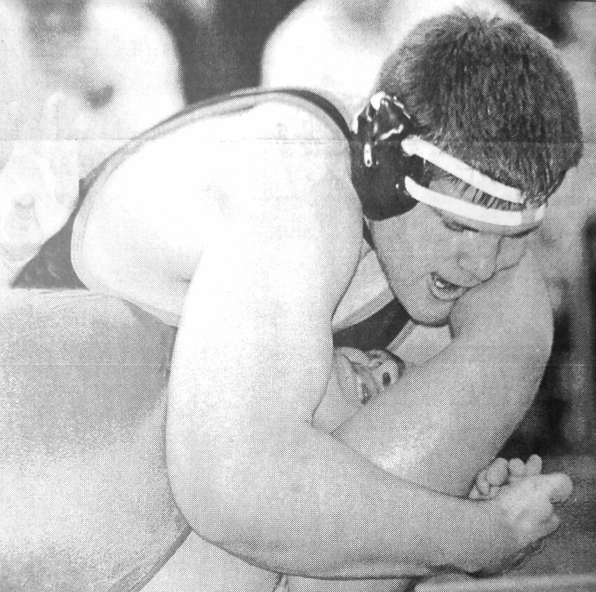 Fort Calhoun wrestler Spencer Oxford, top, competes against Syracuse's Chad Stafford during the 2001 Nebraska Capitol Conference Tournament.