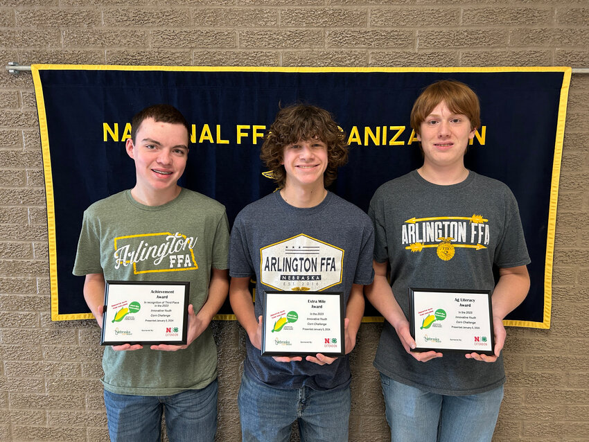 From left, Ethan Hilgenkamp, Wes Monke and Aaron Fuchs with awards earned in the 2023 Innovative Youth Corn Challenge. They earned third place as a team, tied for first with their agriculture literacy video and won the Extra Mile award after the awards banquet held on Jan. 5 in Lincoln.