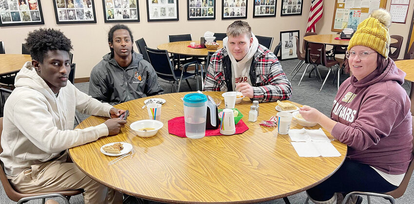 (Left or Right) Jeremiah and Simon Druckenmiller visited their mom at the Happy Days Senior Center soup fundraiser. They were joined by Talen and his mom Linda Mock.