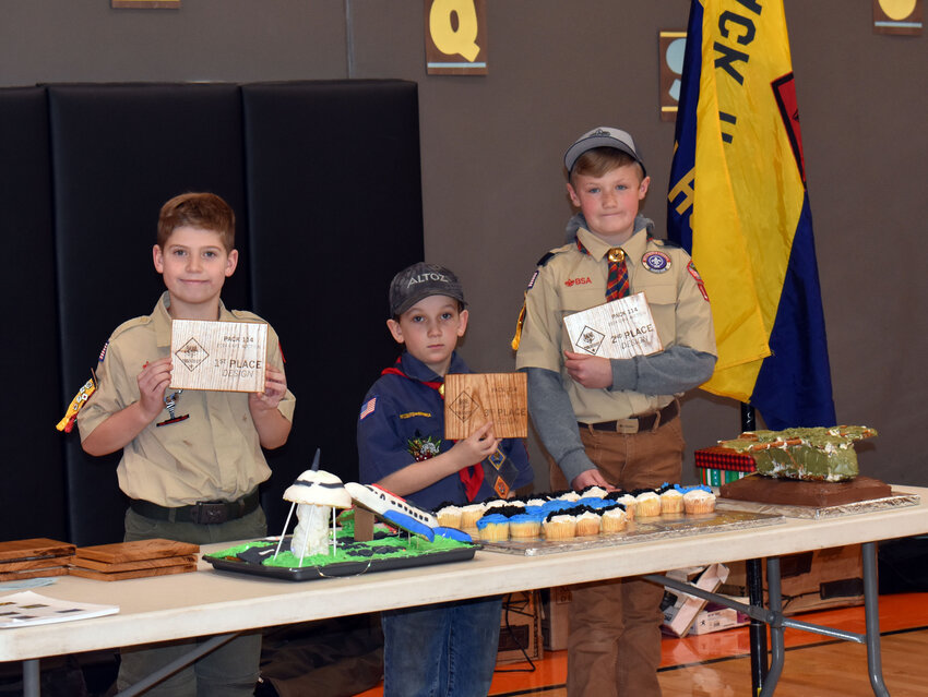 The winners of the Fort Calhoun Cub Scout Pack 114 design category of the Cake Auction, from left, Noah Grove (first place), Stetson Smith (third place) and Collin Sundermeier (second place).