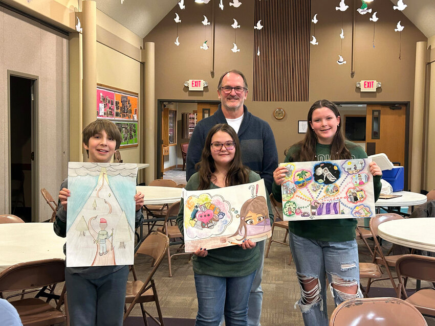 Pictured are the winners of the Blair Lions Club 2023 Peace Poster contest. From left, Liam Smith, first place; Lucy Walker, third place; Lion Glenn Coates, local Peace Contest coordinator; and Avery Baughman, second place...
