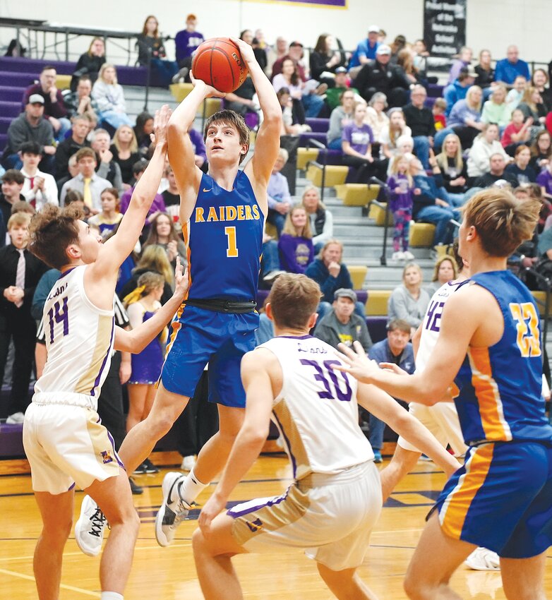 Kolton Kriete #11 is rock steady as he drains the three-point shot over the Lions defender.  Kolton had 15 points, collect 2 rebounds, had 1 assist.