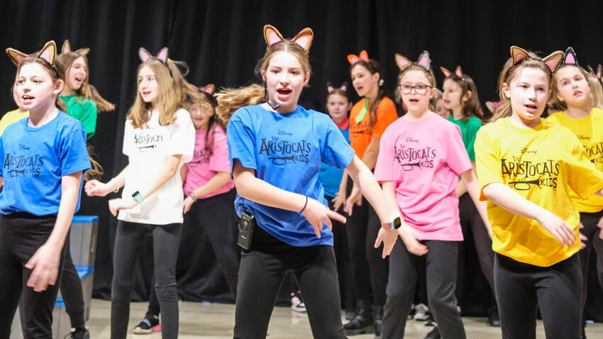 From left, Caitlyn Fitzgerald, Hazel Metzger, Lillian Tetrick, Brooklyn Delisle, and Jillian Beebe sing  &quot;Come On Alley Cats... Sing it!&quot; during the performance of &quot;Aristocats Kids&quot; Thursday at Deerfield Elementary... .