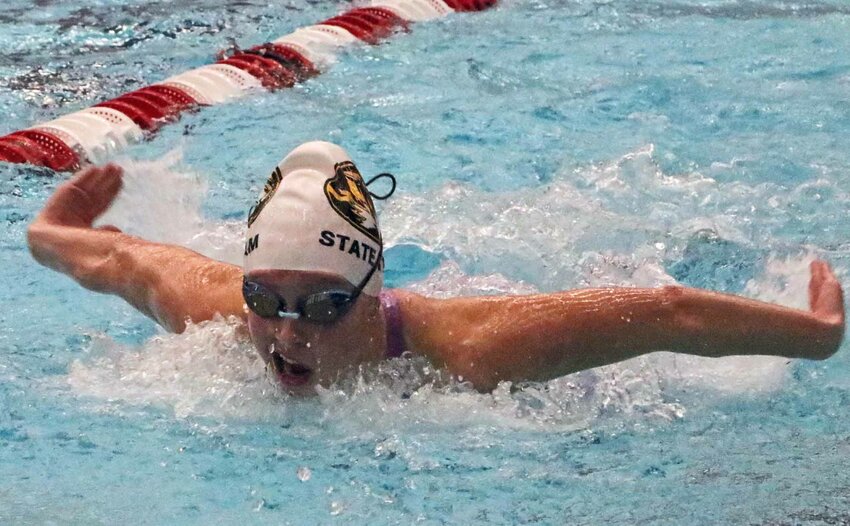 Ryleigh Schroeter of Blair competes in a butterfly race Friday at the Bob Devaney Sports Center.