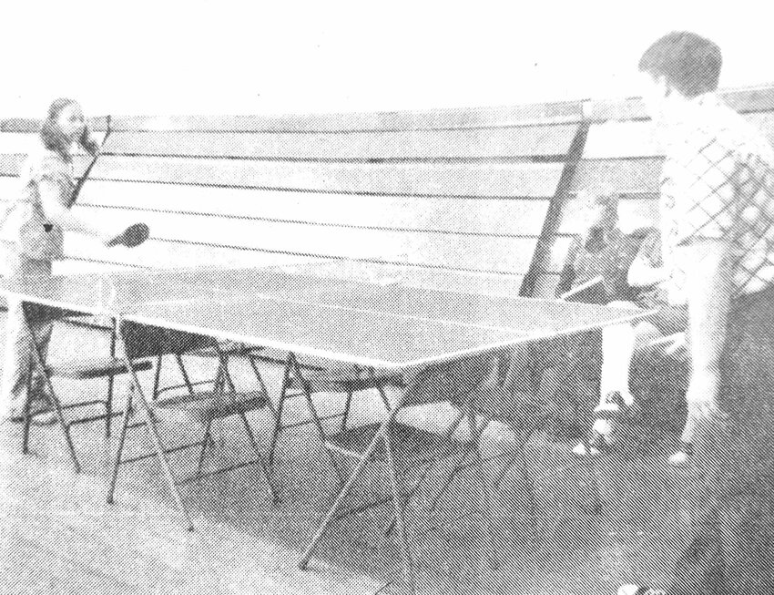 Deb Hilgenkamp, left, competes against Kevin Sorensen during a 1974 FCA ping-pong tourney at Arlington High School.