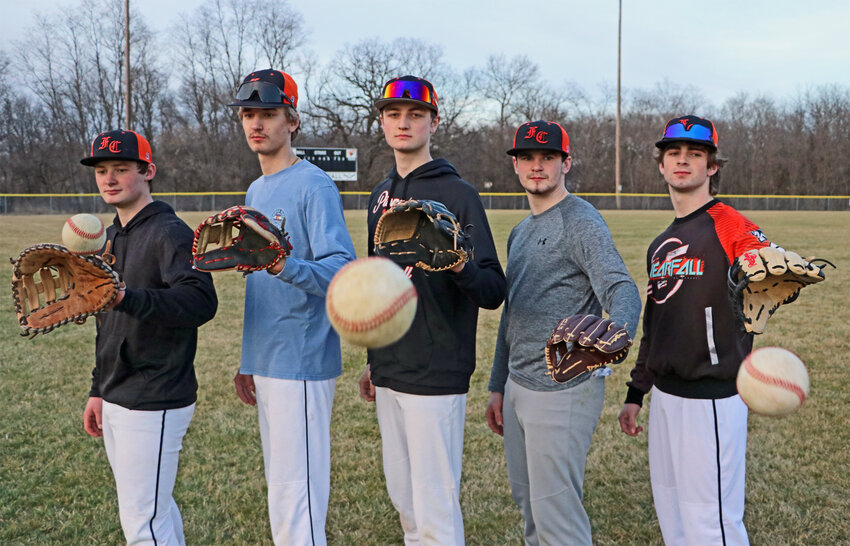Fort Calhoun High School seniors Carter Christensen, from left, Jordan Back, Declyn Otte, Jefferey Pringle and AJ Duros pose for a photo Tuesday after practice. The Pioneers have a wealth of experience back in the lineup as they prepare for the new spring season.
