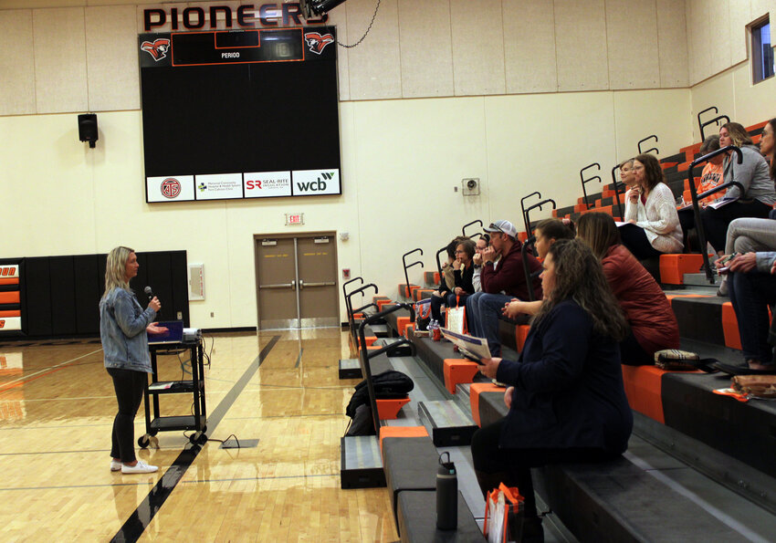 Guests attend a discussion on digital and online safety Monday evening at Fort Calhoun High School during the community mental health and safety conference.