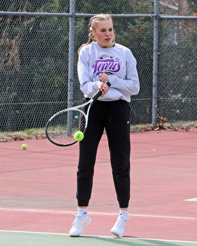 Tailyn Anderson of Blair warms up Thursday before home matches at Stemmermann Park.