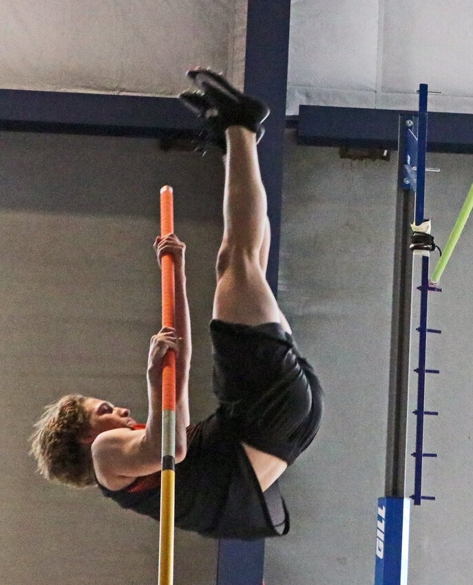 TJ DeMilt of Fort Calhoun competes in the pole vault Friday at the College of Saint Mary in Omaha.