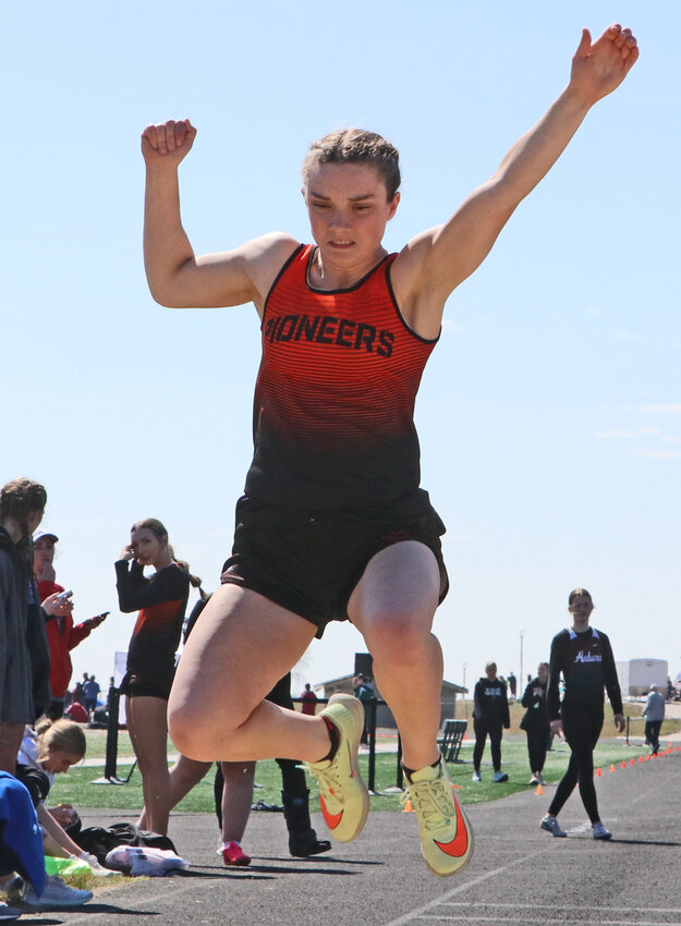 Fort Calhoun's Kaylee Taylor long jumps Thursday at Platteview High School. The Pioneer won the event, clearing 15 feet, 10.5 inches.