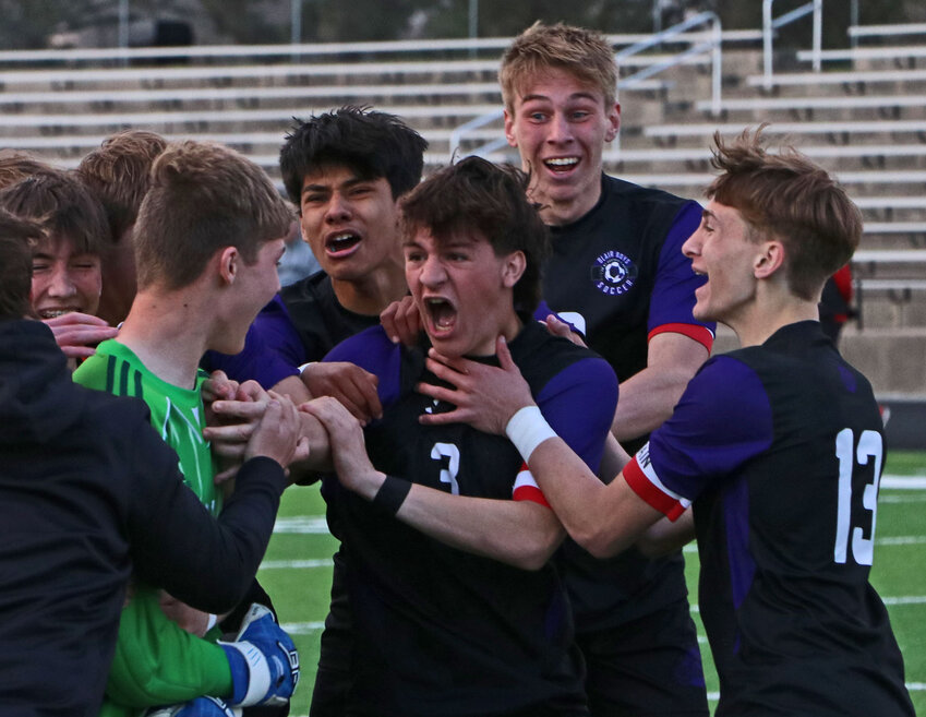 The Blair Bears celebrate an Eastern Midlands Conference Touranment shootout victory Monday at Krantz Field. Pictured are Tommy Scott, from left, goalkeeper Luke Donner, Victor Hernandez, Colton Matney, Crayton Macholan and Eli Belsky.