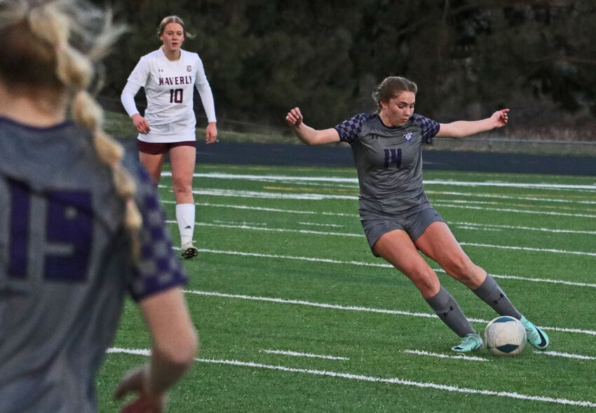 Blair freshman Gueryn Kay, right, boots the ball upfield Monday during an Eastern Midlands Conference Tournament game with Waverly at Krantz Field.