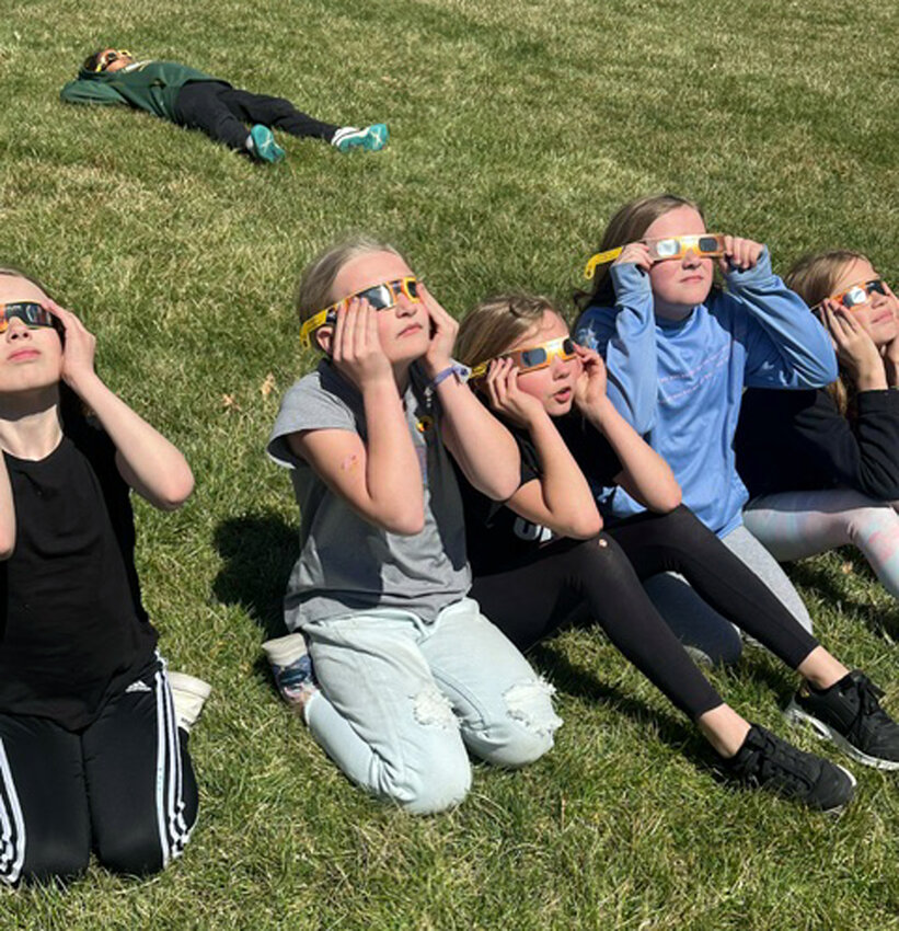 Arlington Elementary students stepped out of their classrooms Monday afternoon to view the total solar eclipse.