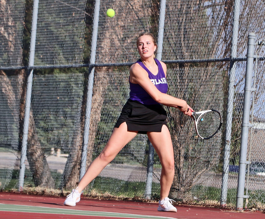Blair tennis' Tailyn Anderson keeps her eye on the ball Thursday at Stemmermann Park. The Bears hosted and were defeated by Bennington.
