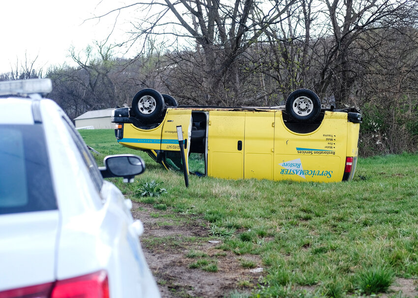 A van overturned along the U.S. Highway 91 curve near 25th Street Tuesday afternoon.
