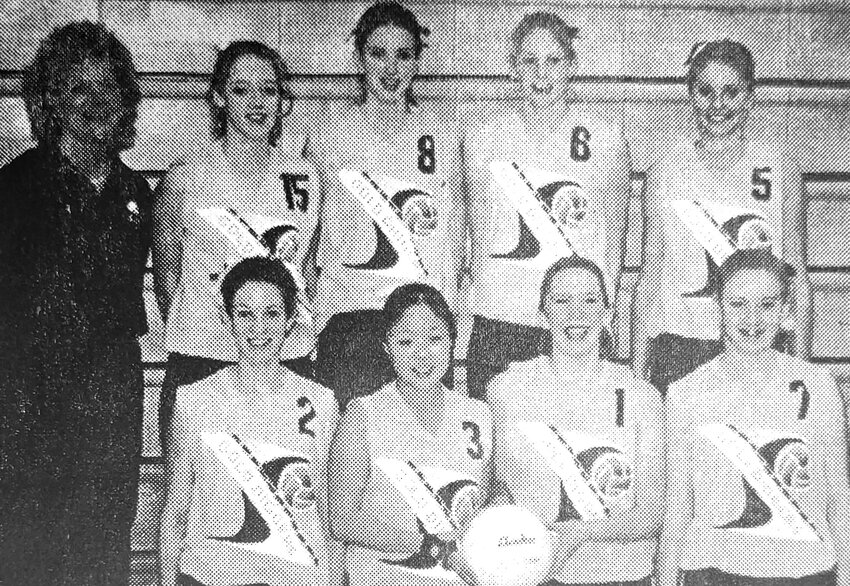 The Gold Diggers volleyball team traveled to Colorado Springs in April 1999. Front row, from left: Ashley Russell, Jen Worth, Megan Johansen and Katarina Nelson. Back row: Coach Lynn Johnson, Cristina Schroder, Amanda Neuhalfen, Stacy Dunklau and Val Wulf.