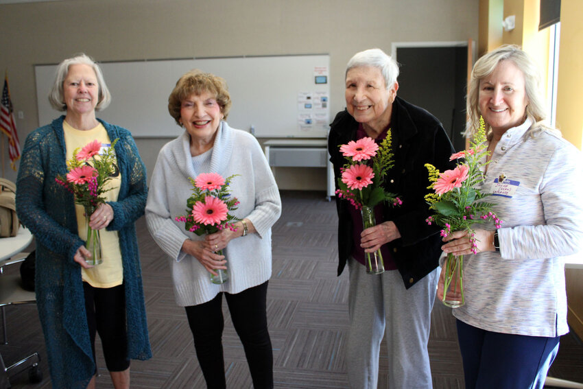 Several Friends of the Library members were recognized for 40 years of service. Pictured, from left: Linda Ferring, Kay Martin, Pat Jorgensen and Janice LaPlante in place of her parents, Mary and Gary Dean.
