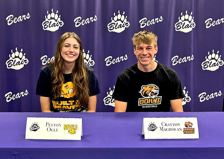 Blair High School seniors Peyton Ogle, left, and Crayton Macholan signed with college athletic programs April 17. Ogle will join the Buena Vista University volleyball team next school year, while Macholan is set to play basketball for Doane University.