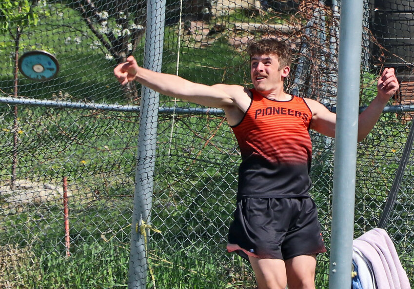 Dylan Keyser of Fort Calhoun competes in the discus Thursay at Louisville High School. Keyser and Pioneers teammate Colby Bentley each earned medals in the event.