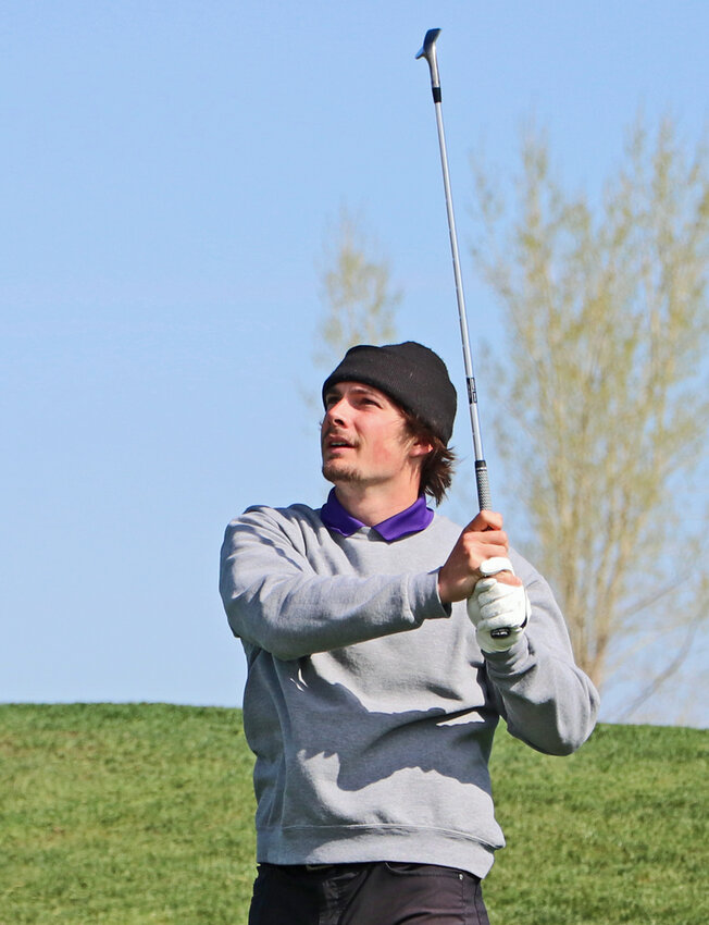 Blair's Bode Soukup watches his shot down the ninth fairway Friday at River Wilds Golf Club.