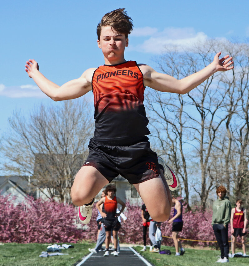 The Pioneers' Gavin Welchert competes in the long jump Tuesday during a track and field meet at Fort Calhoun High School.