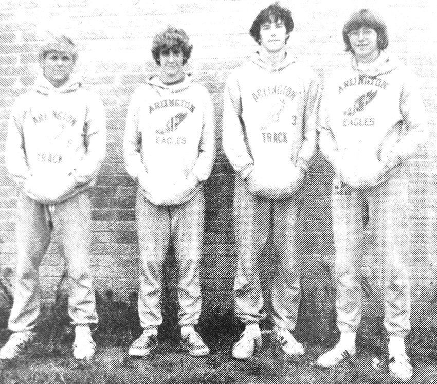 Mike Wofford, from left, Tim Stork, Bruce Goolsby and Gary Peterson combined to set a new conference record for Arlington High School track and field in 1974.