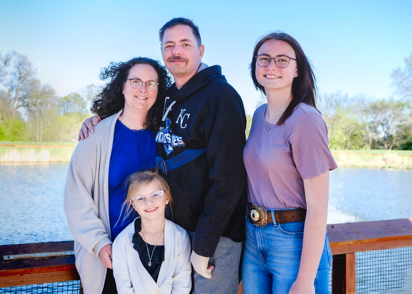Randy Backman is pictured with his family at QLI rehabilitation center in Omaha Sunday afternoon. Pictured from left: Sarah, Randy, Jaydyn and Whitley in front.
