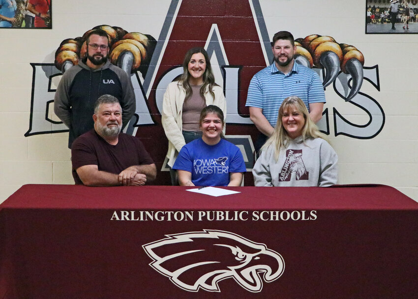 Senior Carly Segebart is the first Arlington High School girls wrestler to sign with a college team — Iowa Western Community College.