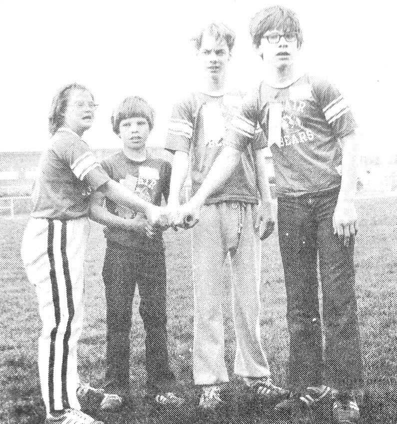 Linda Stadler, from left, Darin Vance, David Satterfield and Mark Vance earned second in the 400-meter coed relay during a 1980 Special Olympics Area Six Meet.