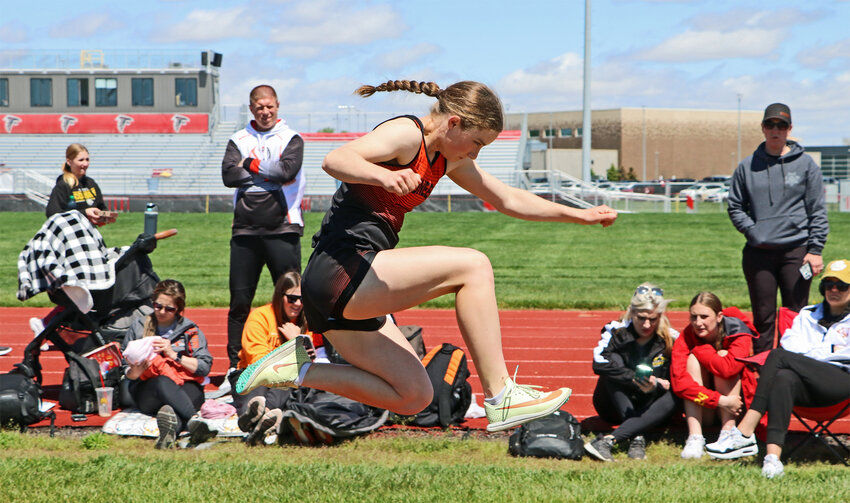 Fort Calhoun's Kaylee Taylor competes in the triple jump Monday during the Nebraska Capitol Conference Meet at Douglas County West. The Pioneers and Arlington Eagles participated after the event was postponed from Saturday.