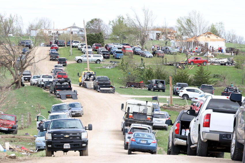 Washington County residents south on County Road 33 gather to help their neighbors Saturday.