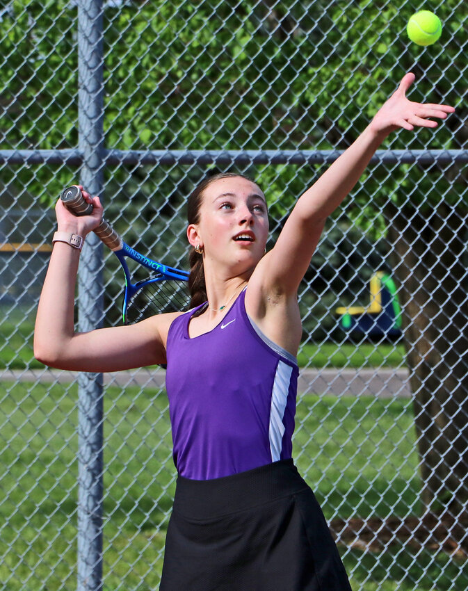 Annemarie Proksel of Blair serves the tennis ball Thursday during a dual with Omaha Skutt at Stemmermann Park.