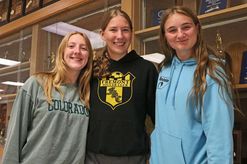 Arlington High School's Grace Siver, from left, Maddie Larsen and Gwen Bostwick all earned varsity status during their school's first-year soccer co-op with Fremont.