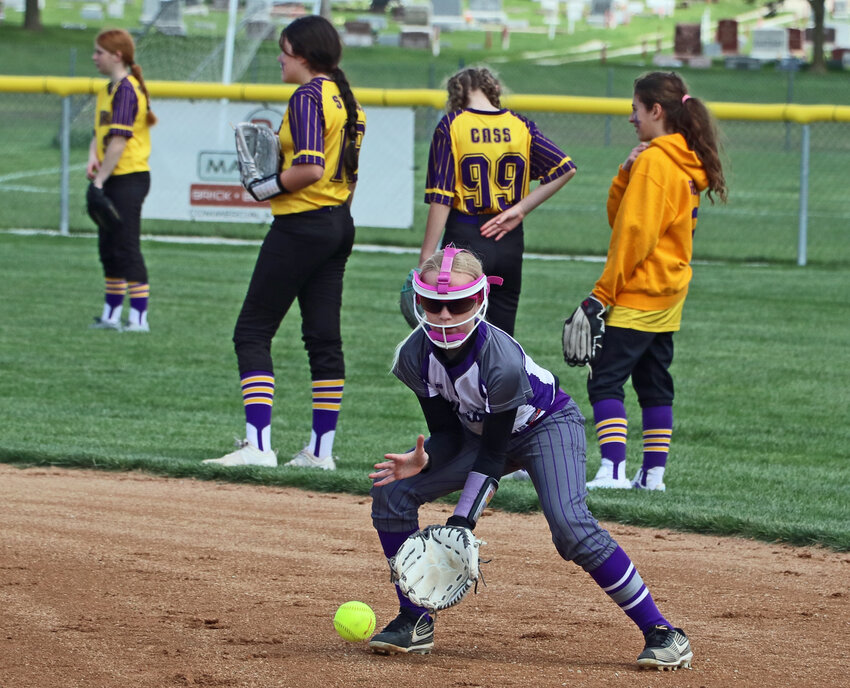 Harper Hinkel of the Blair Chaos fields a grounder Saturday during warmups for the age 12 and younger Blair Youth Softball Assocation May Open. Teams across to age divisions competed during the tourney at the Youth Sports Complex.