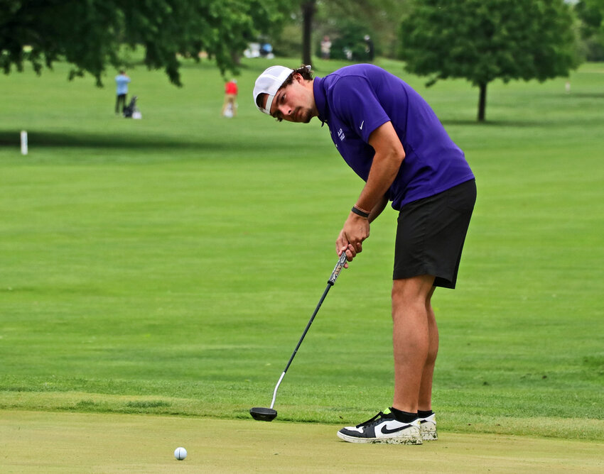 Bode Soukup of Blair putts Monday during the Class B-2 District Tournament at River Wilds Golf Club.