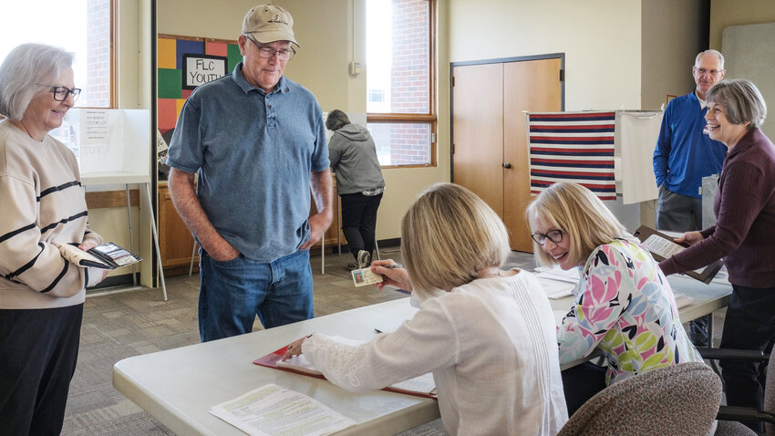 Cindi and Tom Randall vote at First Lutheran Church Tuesday morning.