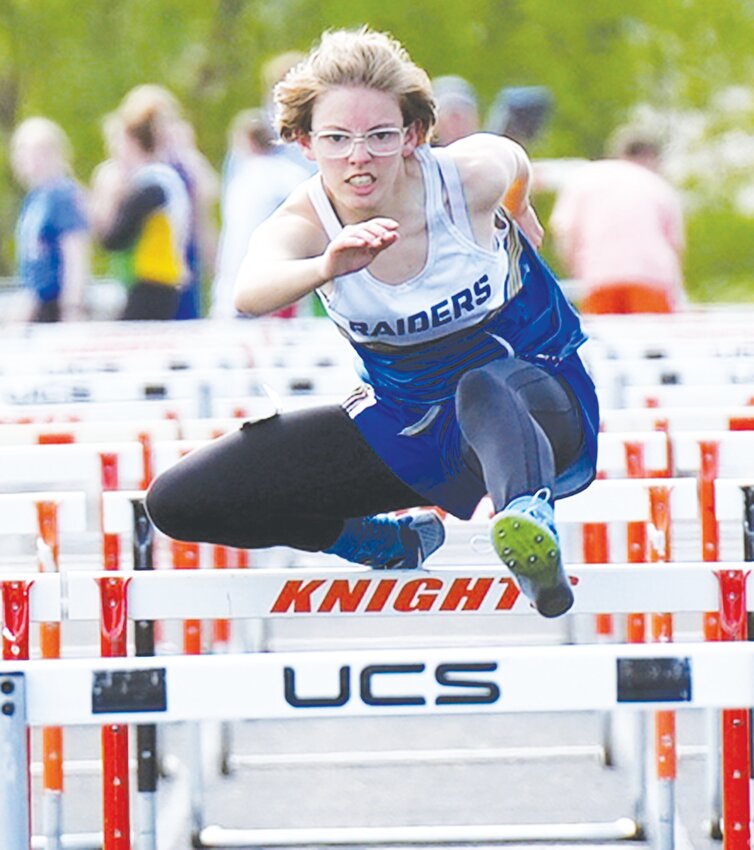 Willow Geiger pushes through to the finish line and punches her ticket to state in the Girls 100 Meter Hurdles.