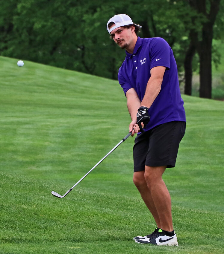 Blair senior Bode Soukup chips onto the second green Monday duringthe Class B-2 District Tournament at River Wilds Golf Club. The Bear finished tied for 10th overall, earning a state tourney qualification.