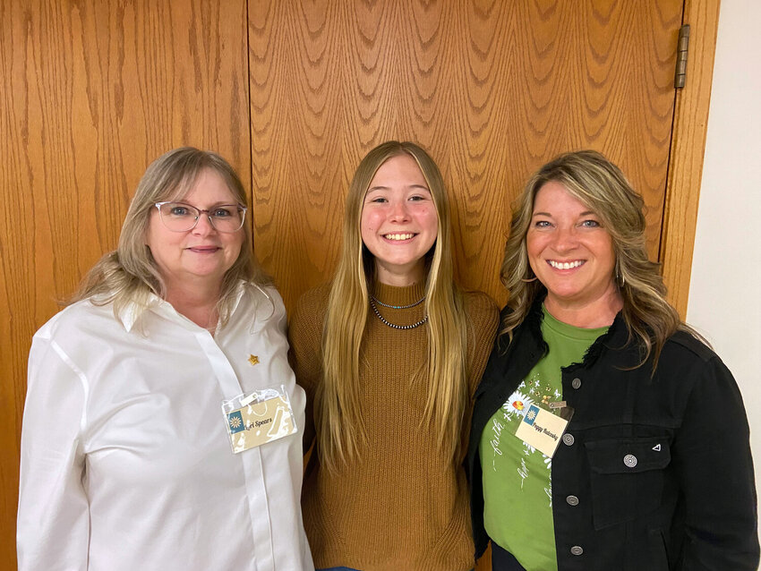 Brooke Hilgenkamp, center, is pictured with P.E.O. members Lori Spears, left, and Peggy Rutcosky.