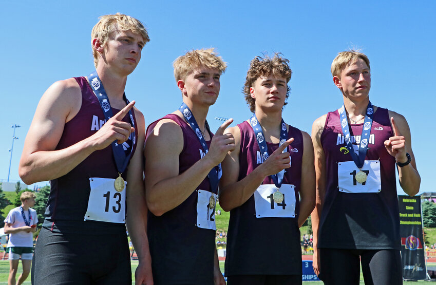 Arlington High School's Kaden Foust, from left, Kevin Flesner, Dallin Franzluebbers and Nolan May combined to win the Class C 3,200-meter relay Friday during the NSAA State Track and Field Championships at Omaha Burke Stadium.