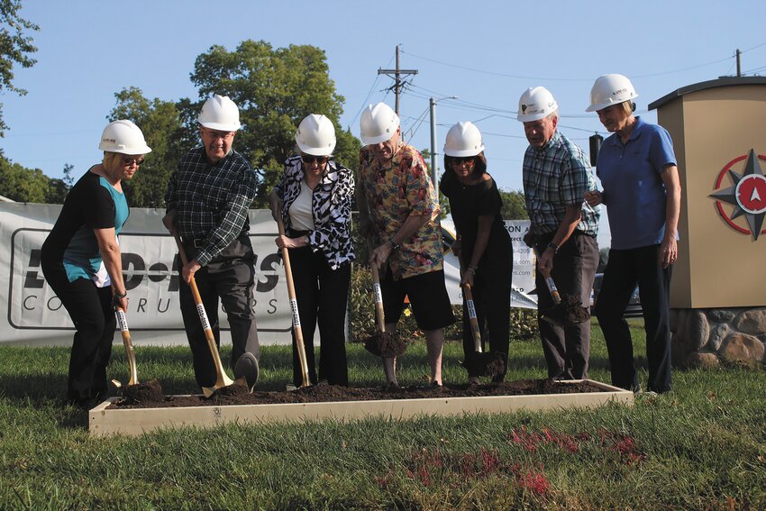 From left, Faith Norwood, Pat Tripp, Jane Hunt, Hugh Hunt, LeeAnne Crist, Coale Johnson and Julie Ashton take part in the ceremonial groundbreaking ceremony Wednesday morning at the Washington County Museum.