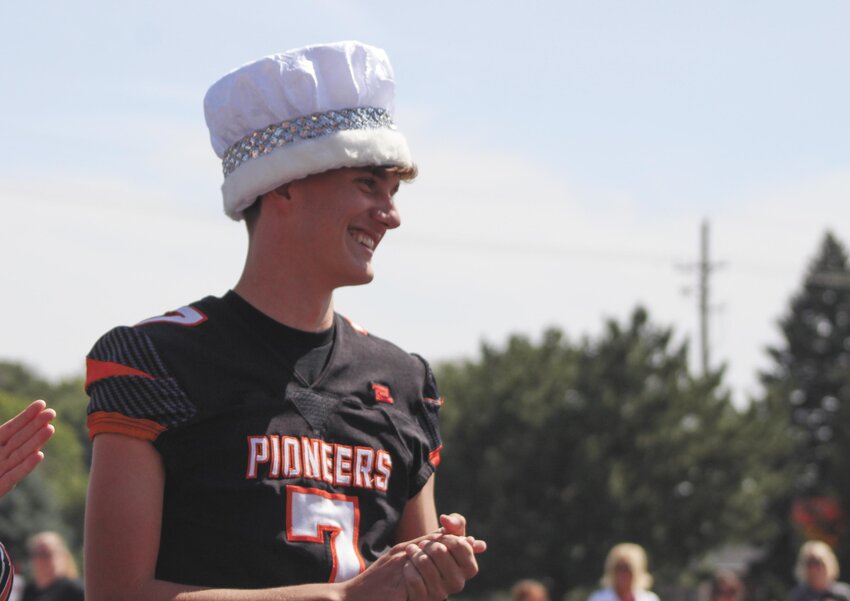 Max Halford smiles after being crowned Fort Calhoun High School homecoming king last Friday.