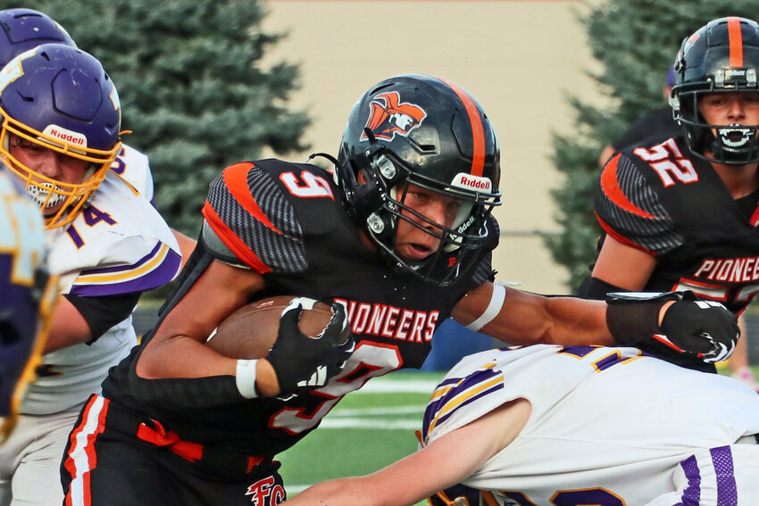 The Pioneers' Quentin Billesbach carries the football Monday during a junior varsity game against Tekamah-Herman at Fort Calhoun High School. Today, the varsity FCHS team plays at Pierce.