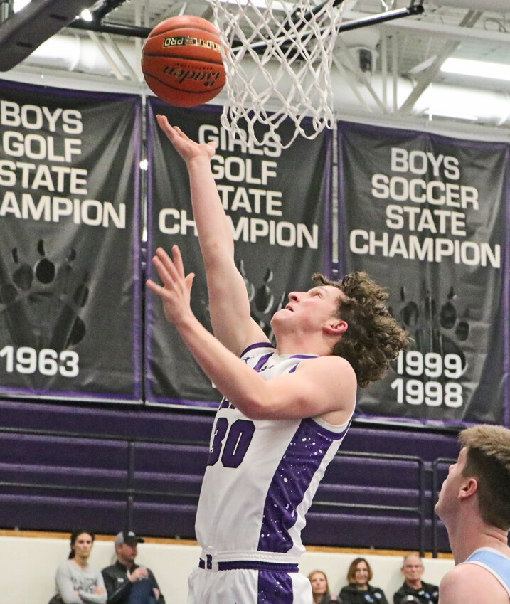 The Bears' Aidan Slominski scores a layup Thursday against Elkhorn North at Blair High School.