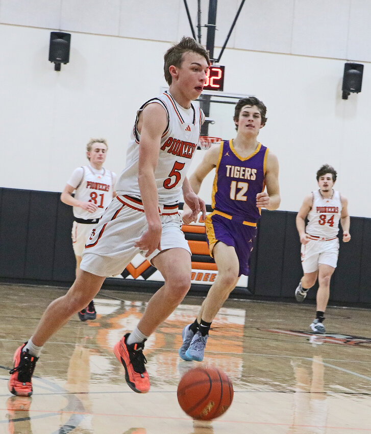 The Pioneers' Kade Foy leads a break down the floor Thursday against Tekamah-Herman at Fort Calhoun High School.