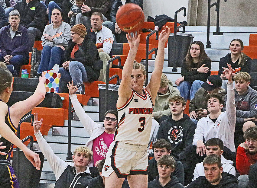 The Pioneers' Raeann Massey shoots a 3-pointer Thursday against Tekamah-Herman at Fort Calhoun High School.