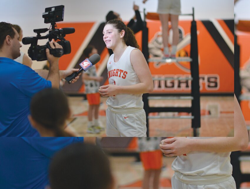 Briar Ray gets some prime time coverage from the media as the district final leading scorer with 19.