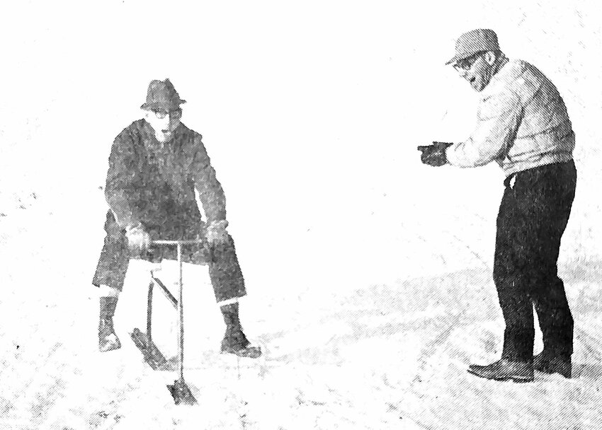 Keith Meier, left, gives the Ski-Daddle a try as Lloyd Marshall watches in 1970.