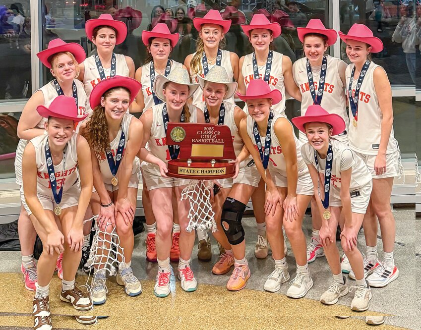 Lady Knights get it done in Lincoln securing a Class C2 State Basketball Championship over the weekend.  Congratulations to coaches Scot Guzinski, Chris Johnson, and Eric Mlinar and team members (front from left) Carolyn Magnusson, Briar Ray, Bailey Pelan, Adi Rennerfeldt, Emma Anderson, and Sabrina Rost; back from left, Naomi Gahan, Brinley Burton, Brylee Ahrens, Marysa Moseman, Hilary Ray, Sonya Guzinski, and Mia Thomsen!  Read more on the amazing feat inside.